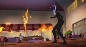 Eshu facing off against Vixen.