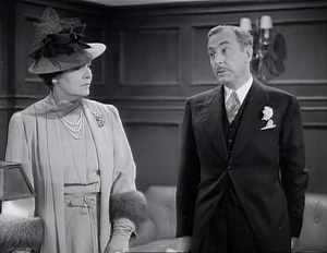 Grover trying to convince Martha that calling the police could result in "undesirable publicity"