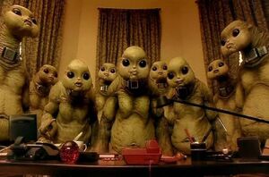 Jocrassa and the other Slitheen waiting on the phone call for codes.