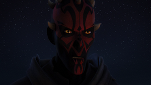 Maul staring down Obi-Wan at the campfire.