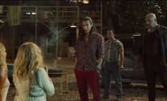 Morgado confronting Emily and Linda with his crew.