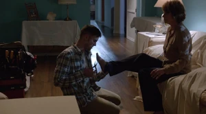 A.J. Yates kidnaps Evelyn Vogel, prepared to break her toes if she attempts to escape.