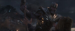 Thanos grabs Stormbreaker as Thor summons it.