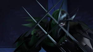 wicked grin; although he’s masked.