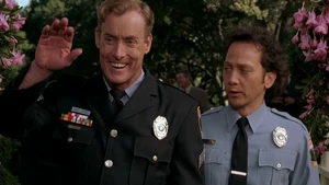 Sisk waving while asking Mange to keep a low profile at the party