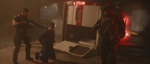 Makarov apprehended by Captain Price and Soap.