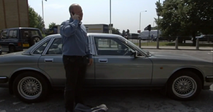 Phil arrives at the rendezvous where Dan has kidnapped Mel and forced him to deliver the £200,000 ransom money in exchange for her safety (2001).