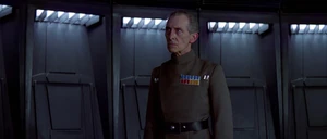 Tarkin angrily stands up during the meeting.
