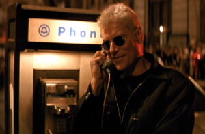 The Party Crasher calling the police to tell them he's about to kill again.