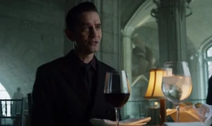 Theo at dinner with Bruce.