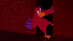 Iago freeing himself from the hidden door.