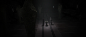 Sidious leads Dooku to a sacrifical altar basin.