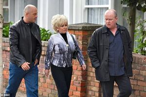 Phil and Grant discuss with Peggy about their plan to exonerate Sam from prison by convincing Sharon that it was Chrissie who killed Dirty Den (2005).