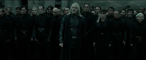 Narcissa and Lucius watching Voldemort declare victory over the Order of the Phoenix and everyone in Hogwarts.