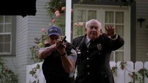 Sisk and the chief trying to arrest Mange for supposedly attacking a hunter the other night