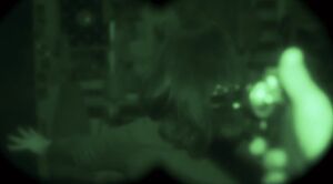 Bill pointing a gun at Clarice.
