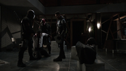 John Diggle, Jr. torturing Alberto Vasquez.