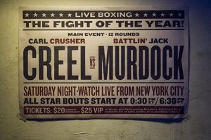 A poster of a wrestling match between Carl Creel and Jack Murdock.