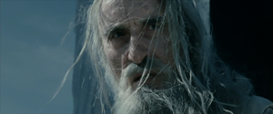 Saruman is shocked when the Ents flood Isengard, destroying his war machines.