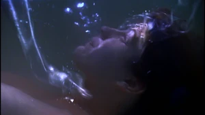 An invisible Jeff Palmer trying to drown Victoria Hardwick.
