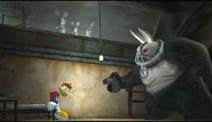 An early screenshot of Sergueï humiliating Rayman in the cell with the Rabbids seen observing in the prototype version of Rayman Raving Rabbids.