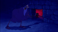 Jafar revealing a secret entrance, successfully manipulating Aladdin and Abu to help him retrieve the lamp.