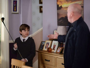 Phil Mitchell being threatened by Ian's youngest son Bobby Beale.