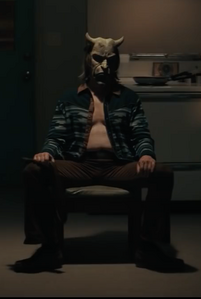 The Grabber sleeping after waiting for Finney to come upstairs.