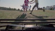 The Lawnmower Charging Towards Beatrice Before Roy Saves Her