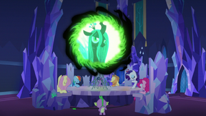 Queen Chrysalis appearing in the communication window by her changelings taking the form of Twilight and her friends including Spike.