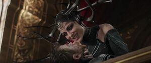 Hela subdues Thor as she mocks his strength and power