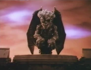 Deadly spell gargoyle2.jpg (26 KB) The gargoyle kneeling atop Hackshaw's mansion, before being brought to life.