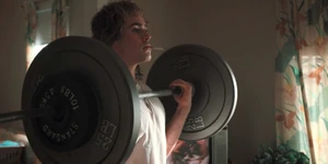 The next day, Billy works out at his home.