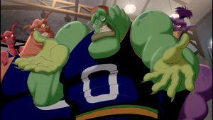 Bang smiling tauntingly at Michael Jordan while calling him chicken.