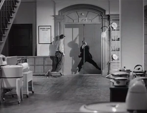 Grover sliding down the elevator