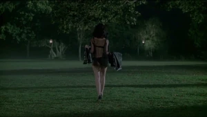 Serleena walks away from Central Park.