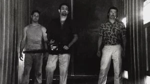 Welsh (right) standing with Santos Jimenez (center) and Estrada (left).