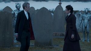 Missy explains her motives to the Doctor in a graveyard.