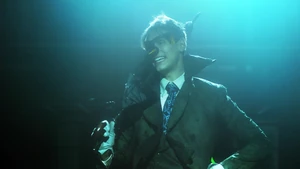 Nygma imitates Penguin in Cherry's club.