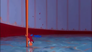 Iago sliding off the staff.