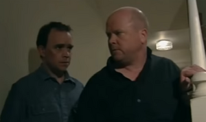 Phil squares off against Mark in his house (2002).