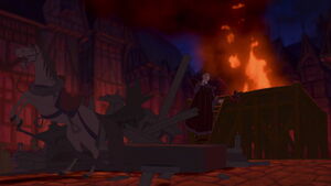 Quasimodo drops a large wooden beam from the balcony and it smashes Frollo's carriage.