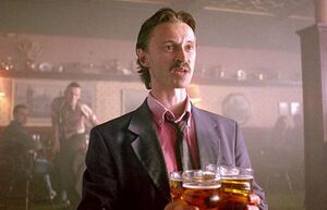 Begbie in the London pub, about to attack the man who made him spill beer on himself.