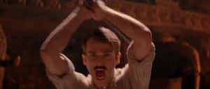 Boone about to kill Mowgli with his sword inside Monkey City.