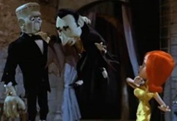 Fang stopping Dracula’s attempt to harm his bride.