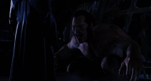 Mr. Hyde flipping around and lands on his gnarled feet.