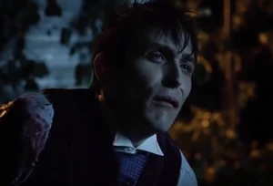 A weakened Penguin begging Edward Nygma for help.