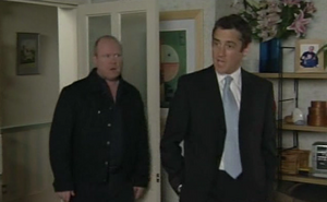 Phil Mitchell feuding against his sister's mobsman husband Andy Hunter.