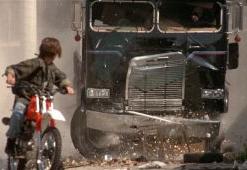 The T-1000 chases John Connor in a tow truck.