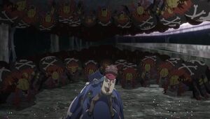 Hiro, KausGammamon and Dokugumon are in the battle